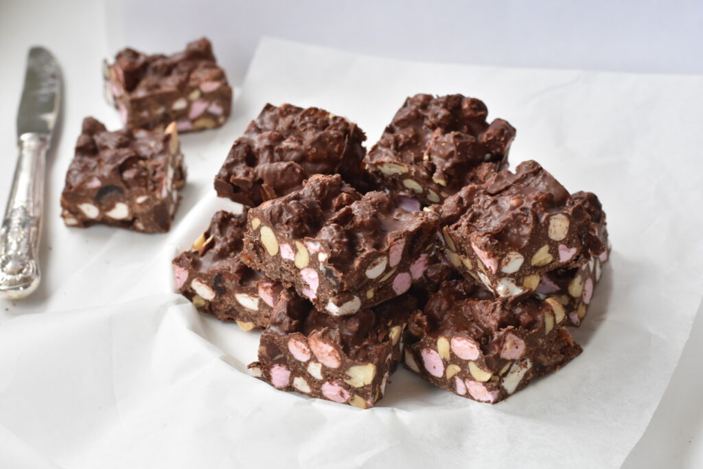 Squares of rocky road on a plate.