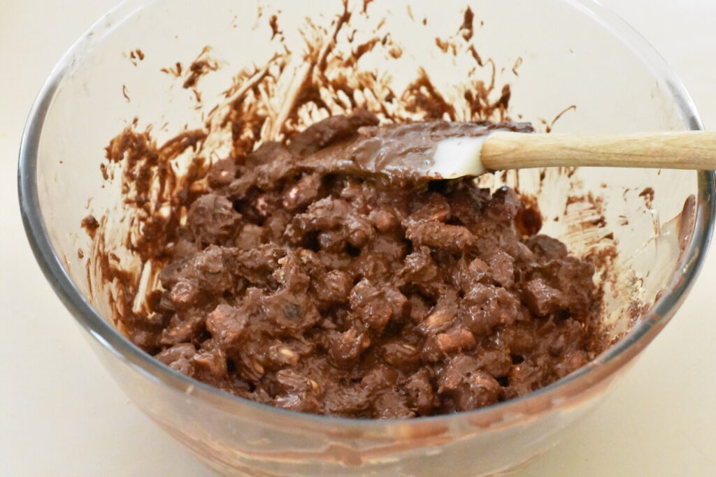 All rocky road ingredients mixed well in a bowl.