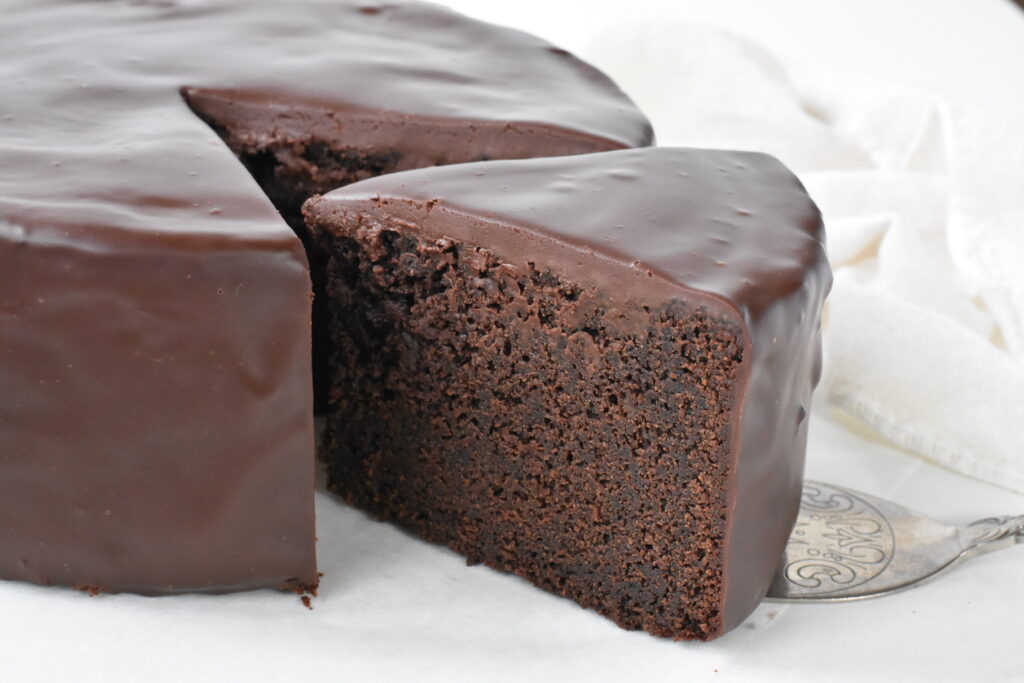 Slice of the Ultimate Chocolate Mud Cake on Server.
