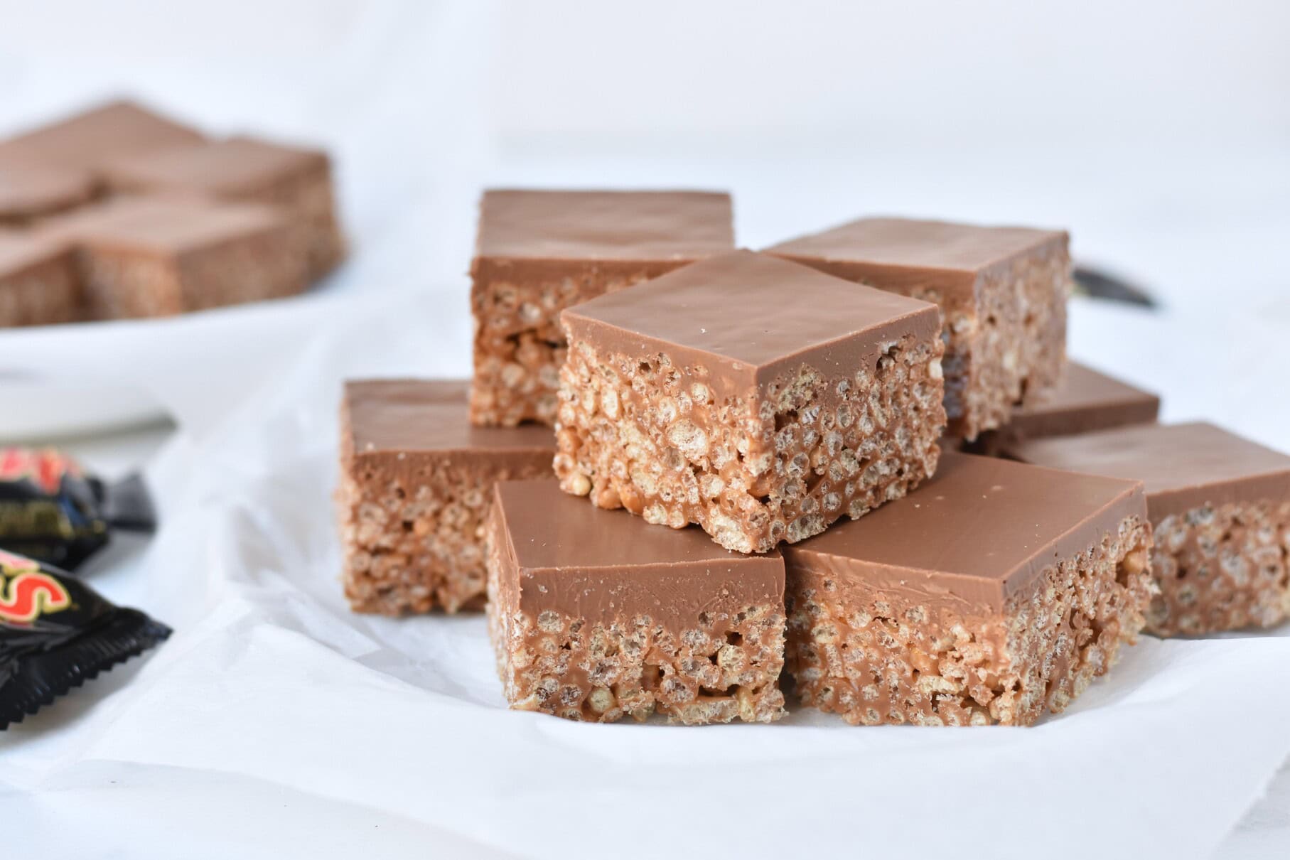 Mars bar slice squares on plate.