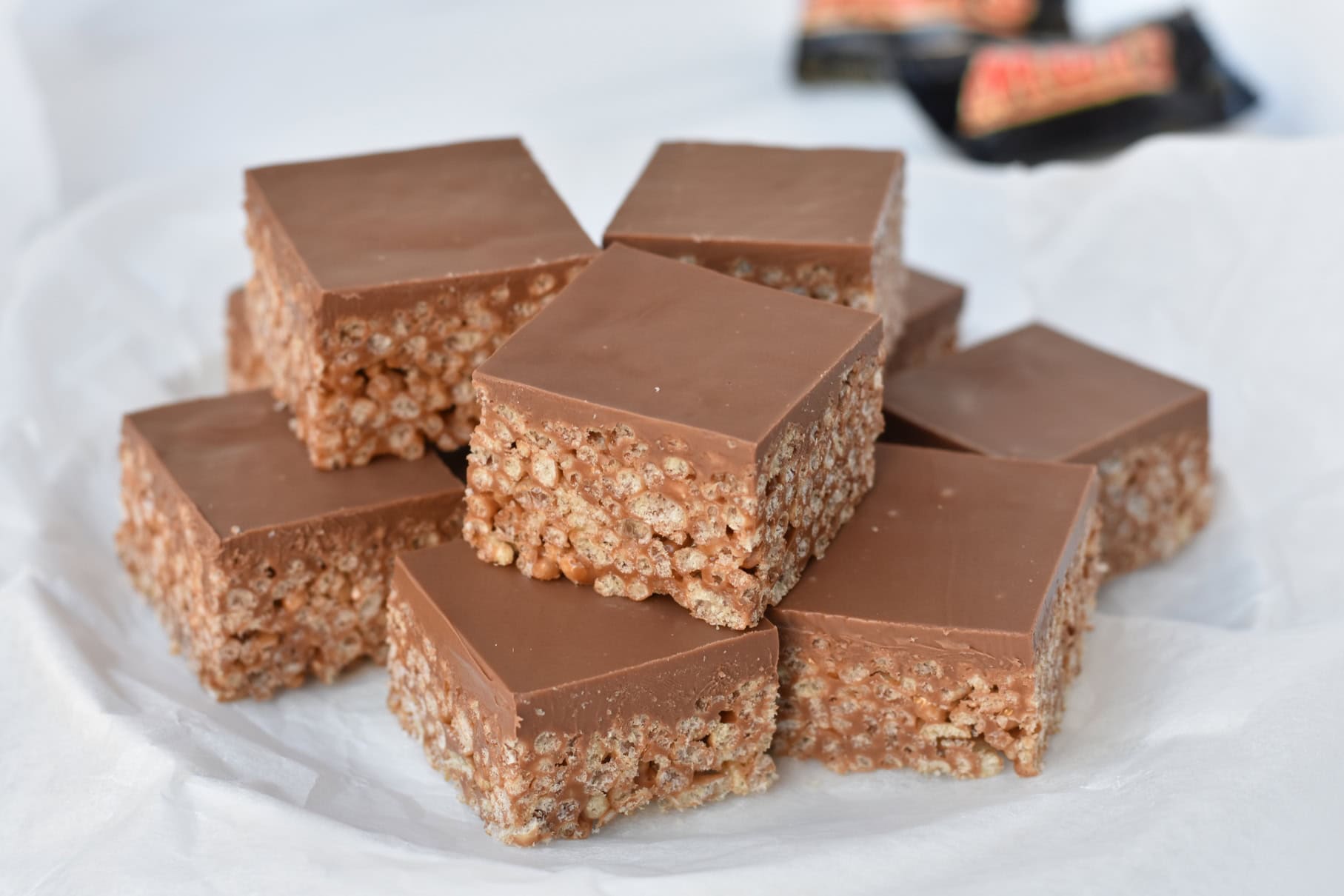 Mars bar slice squares on plate.