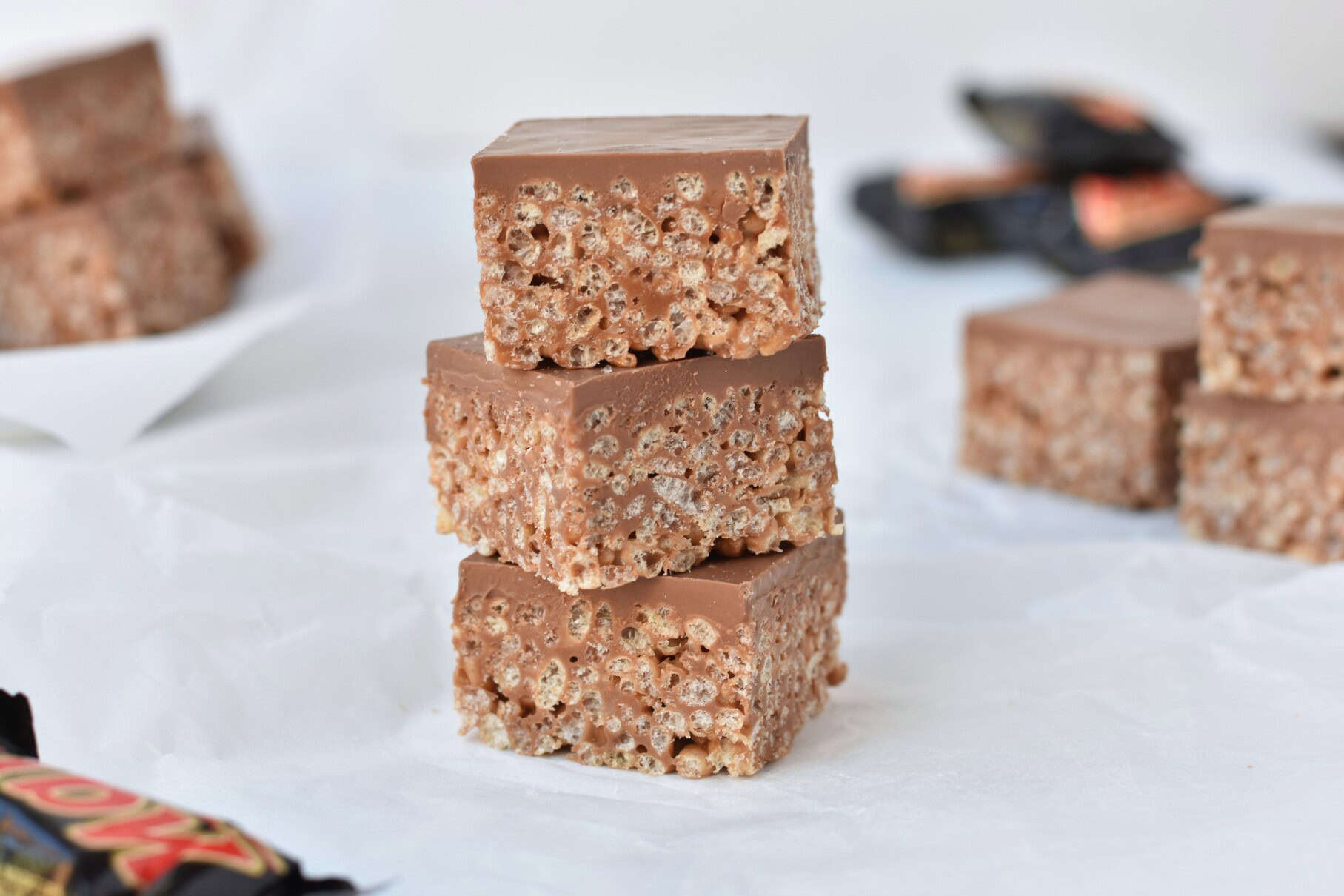 Mars bar slice squares stacked three high.