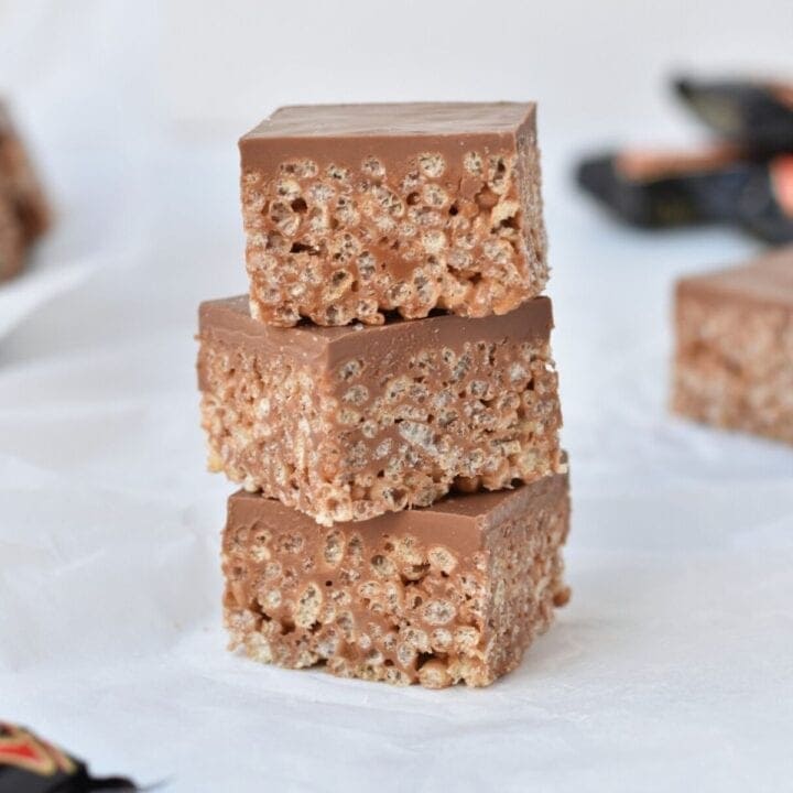 Mars bar slice squares stacked three high.