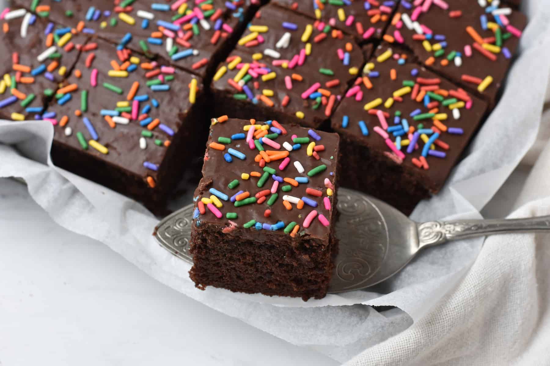 Slice of cake on cake server.