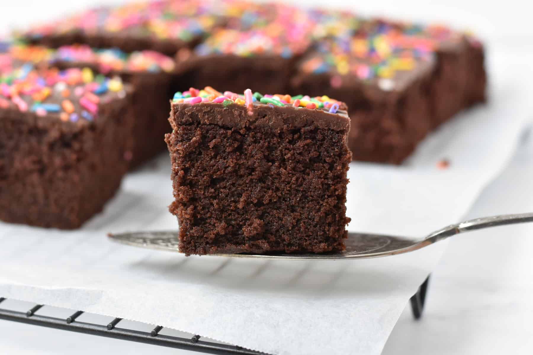Slice of cake on cake server.