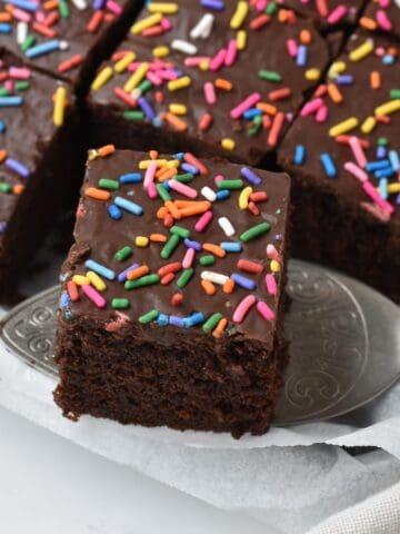 Slice of cake on cake server.