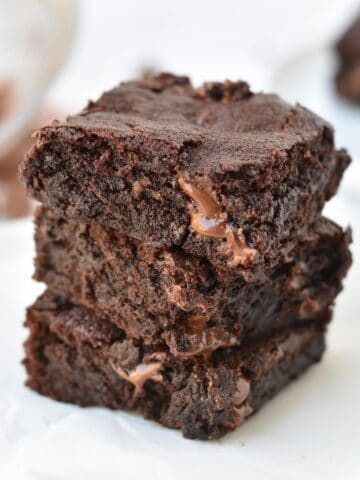 Three brownies stacked on top of each other.