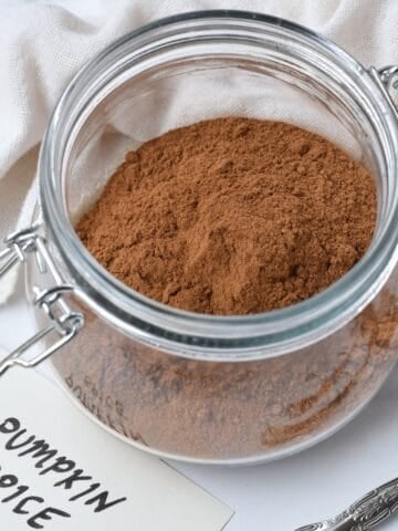 Pumpkin spice mix in a large glass jar.