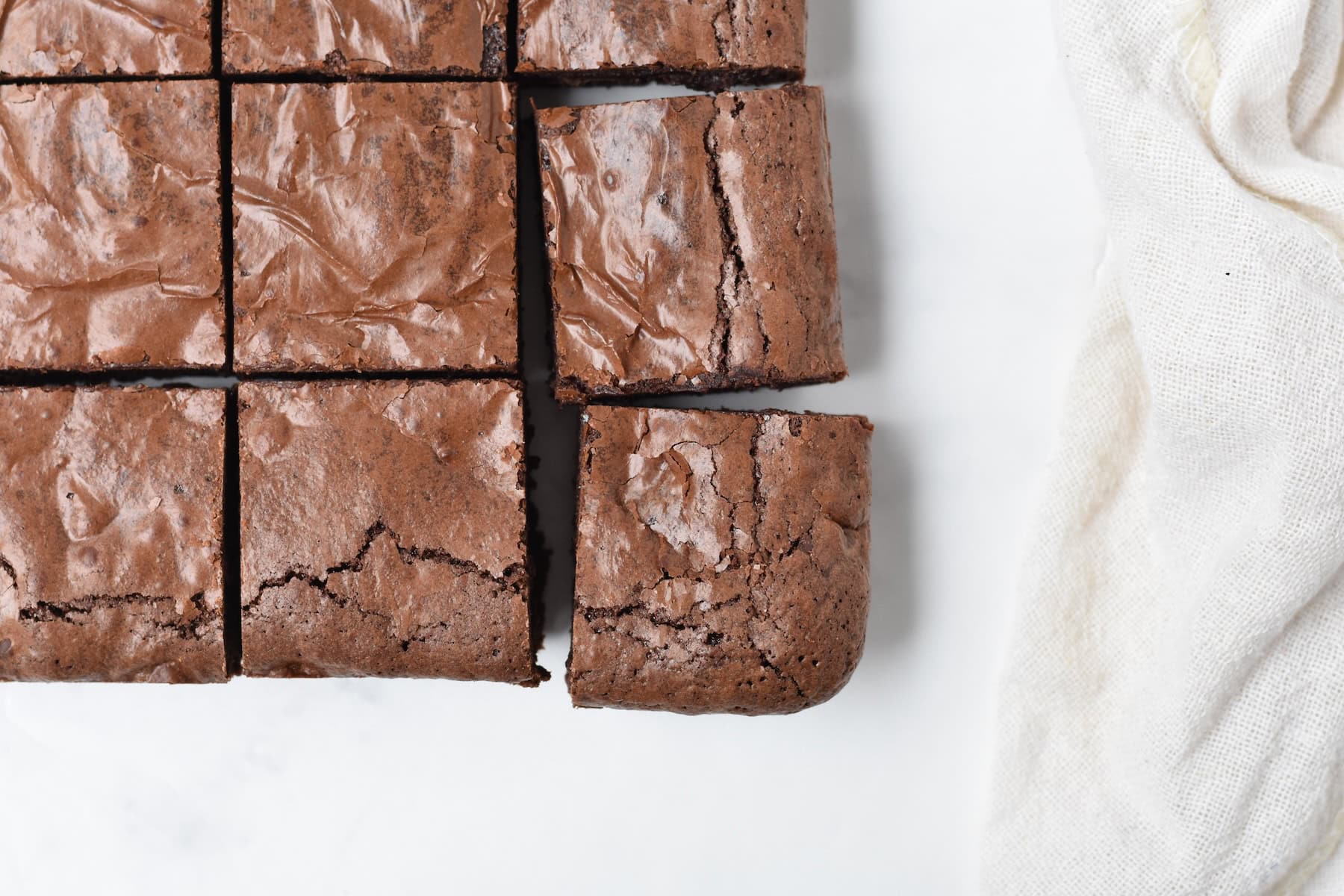 Squares of gluten free brownies.