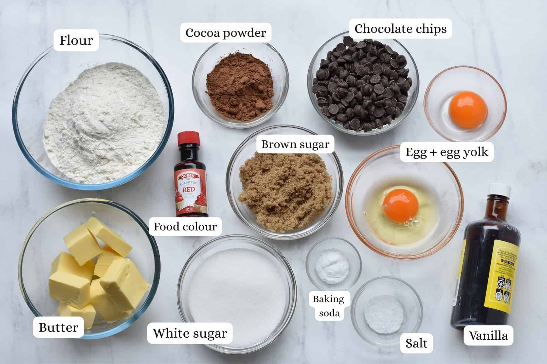 Ingredients in Red Velvet Cookies in bowls.